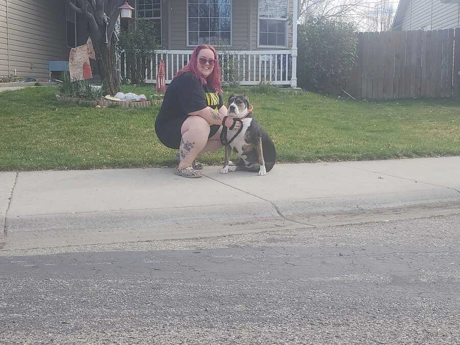Teaira spending time outside with dogs